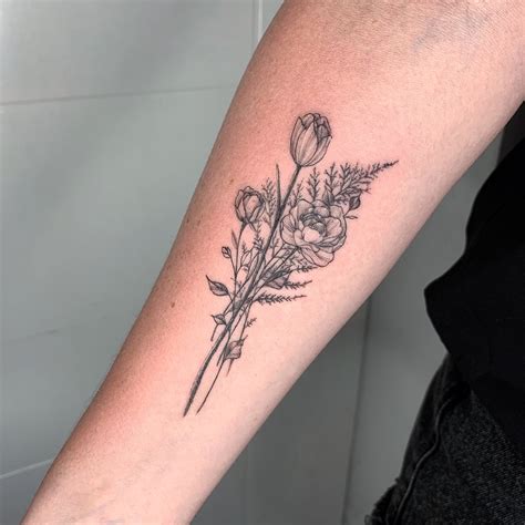 flower tattoo designs on arm|wild flower arm tattoo designs.